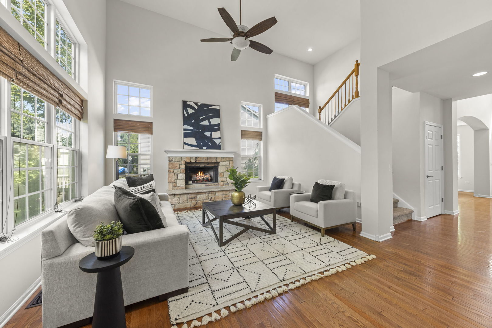 26500 Rustling Birch Way Plainfield, IL 60585 - Photo 7 of 37 a living room with furniture fireplace and a large window