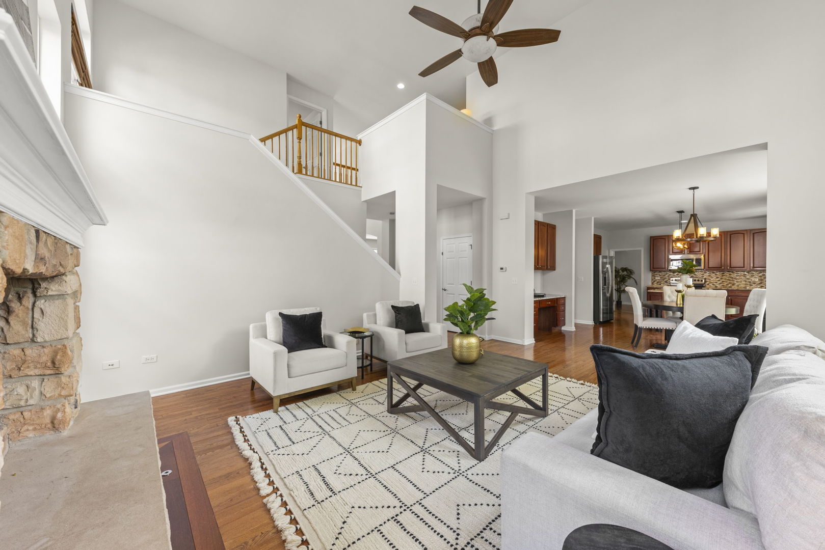 26500 Rustling Birch Way Plainfield, IL 60585 - Photo 8 of 37 a living room with furniture and wooden floor