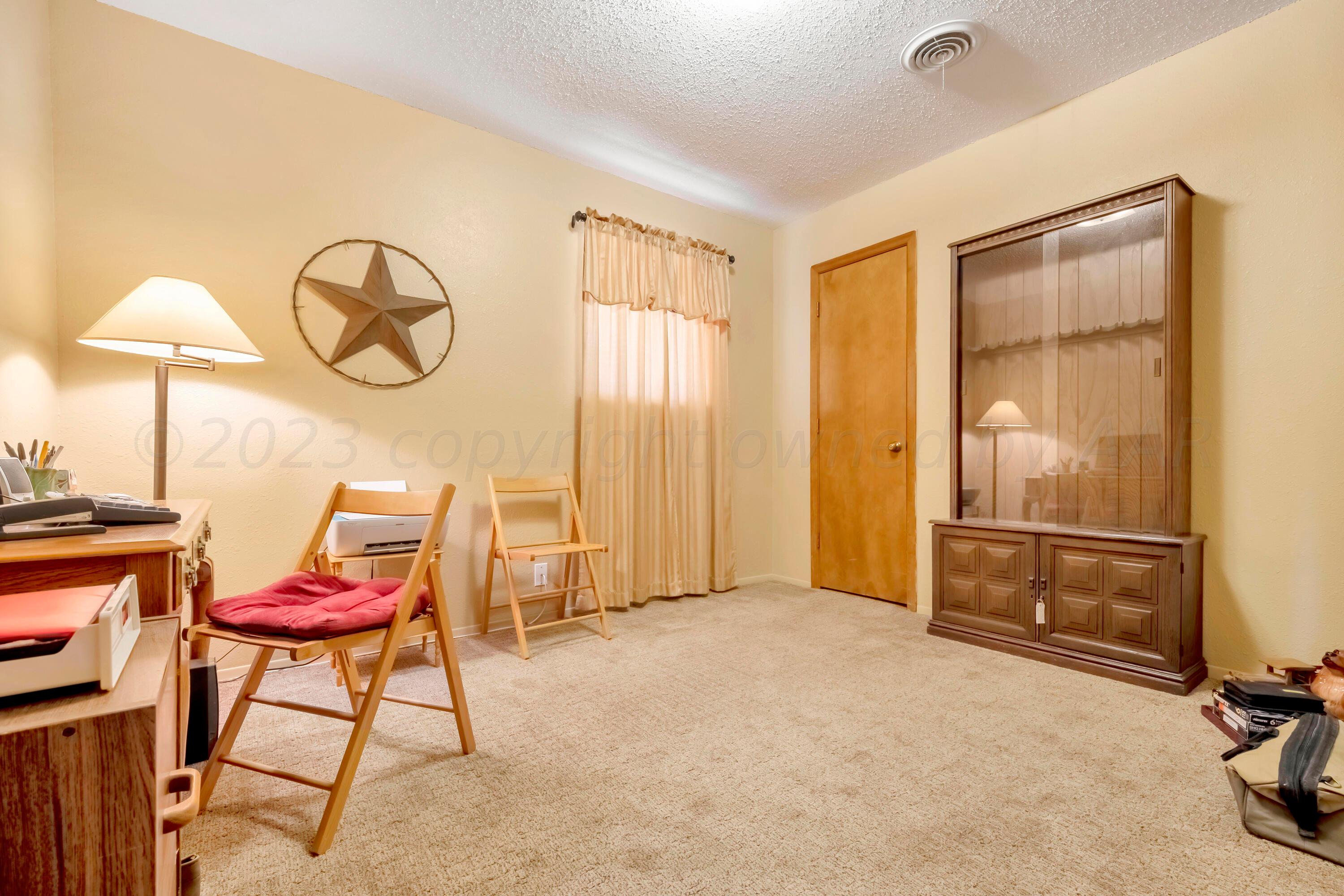 200 West Santa Fe Street Allison, TX 79003 - Photo 20 of 32 a view of a room with gym equipment