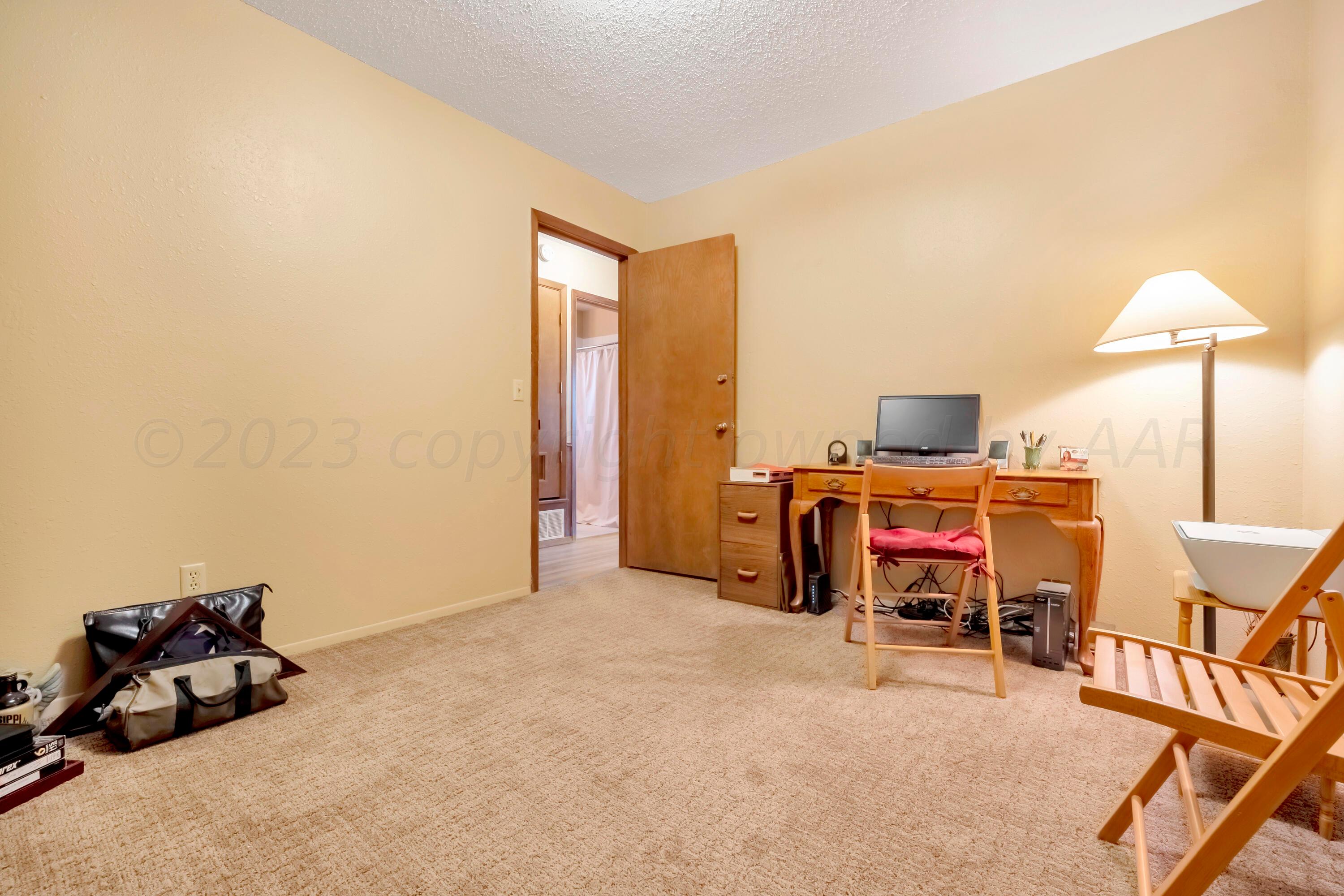 200 West Santa Fe Street Allison, TX 79003 - Photo 21 of 32 a room with furniture
