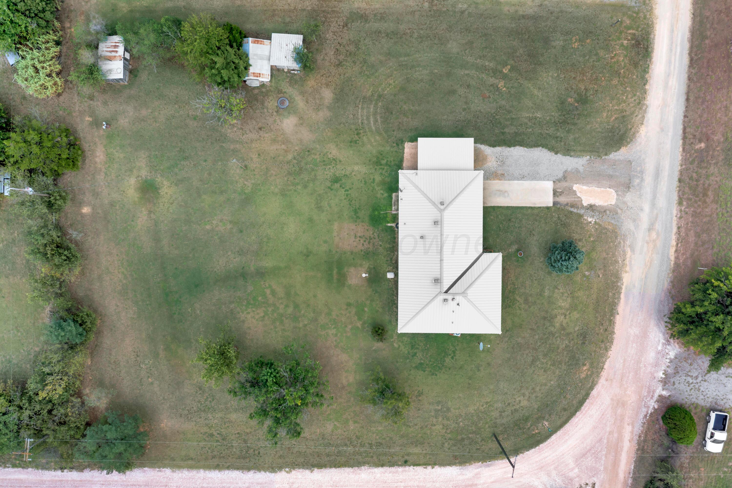 200 West Santa Fe Street Allison, TX 79003 - Photo 29 of 32 an aerial view of a residential houses with outdoor space