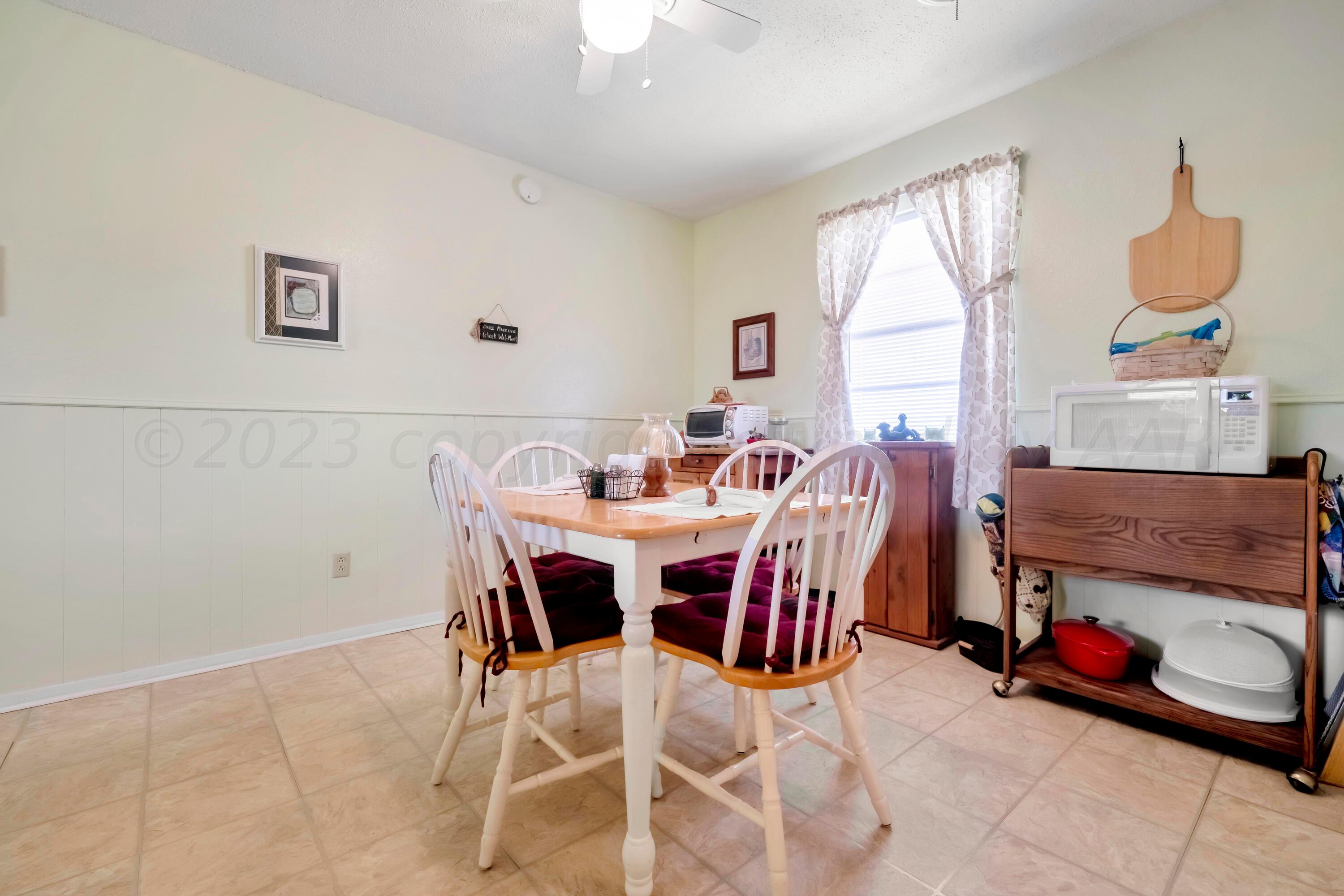 200 West Santa Fe Street Allison, TX 79003 - Photo 8 of 32 a dining room with furniture and window