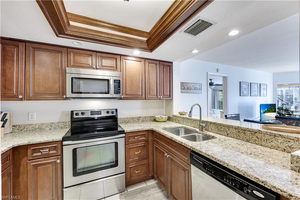 5635 Turtle Bay Drive, Unit 9 Naples, FL 34108 - Photo 3 of 17