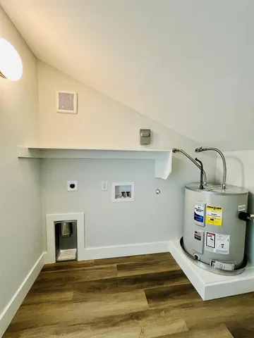 a view of a livingroom with wooden floor