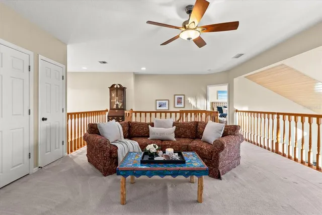 a view of a lake with a house in the background