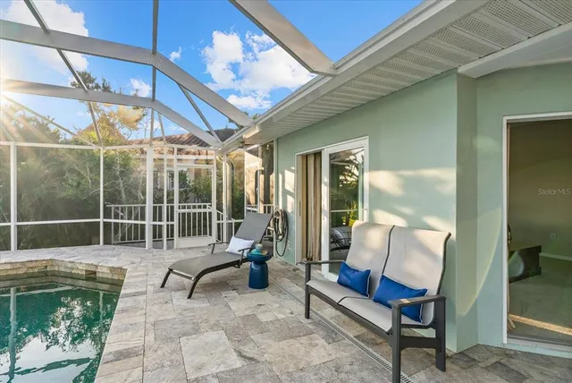 a view of a lake with a house in the background