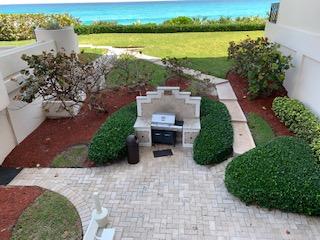 5380 North Ocean Drive, Unit 2E Singer Island, FL 33404 - Photo 19 of 30 an aerial view of a house with garden space and outdoor seating