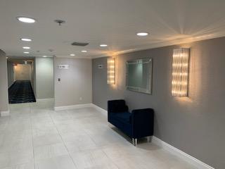 5380 North Ocean Drive, Unit 2E Singer Island, FL 33404 - Photo 20 of 30 a living room with furniture and a large window