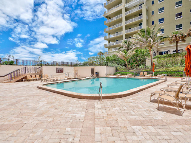 5380 North Ocean Drive, Unit 2E Singer Island, FL 33404 - Photo 30 of 30 a view of a swimming pool with a yard