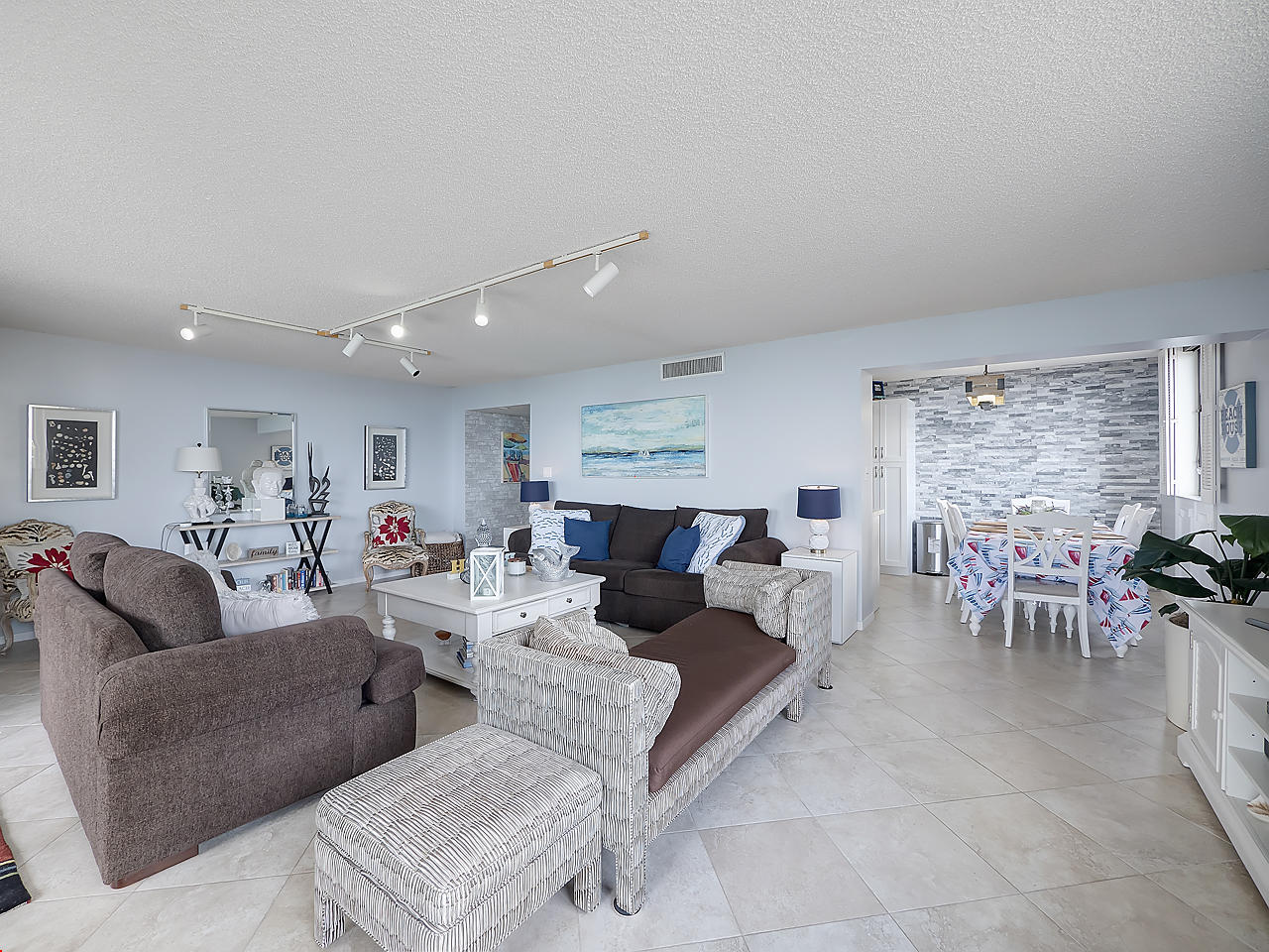 5380 North Ocean Drive, Unit 2E Singer Island, FL 33404 - Photo 9 of 30 a living room with furniture and a large window