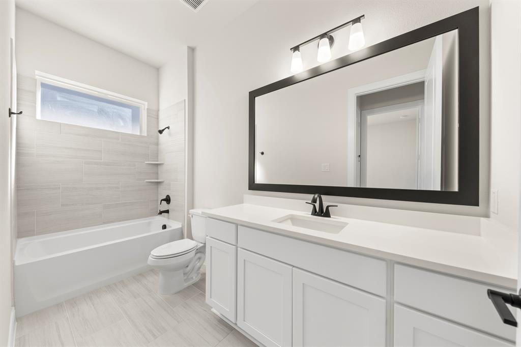 1617 Yorkie Drive Forney, TX 75126 - Photo 4 of 40 6_07. 1617 Yorkie - 2ND Bath