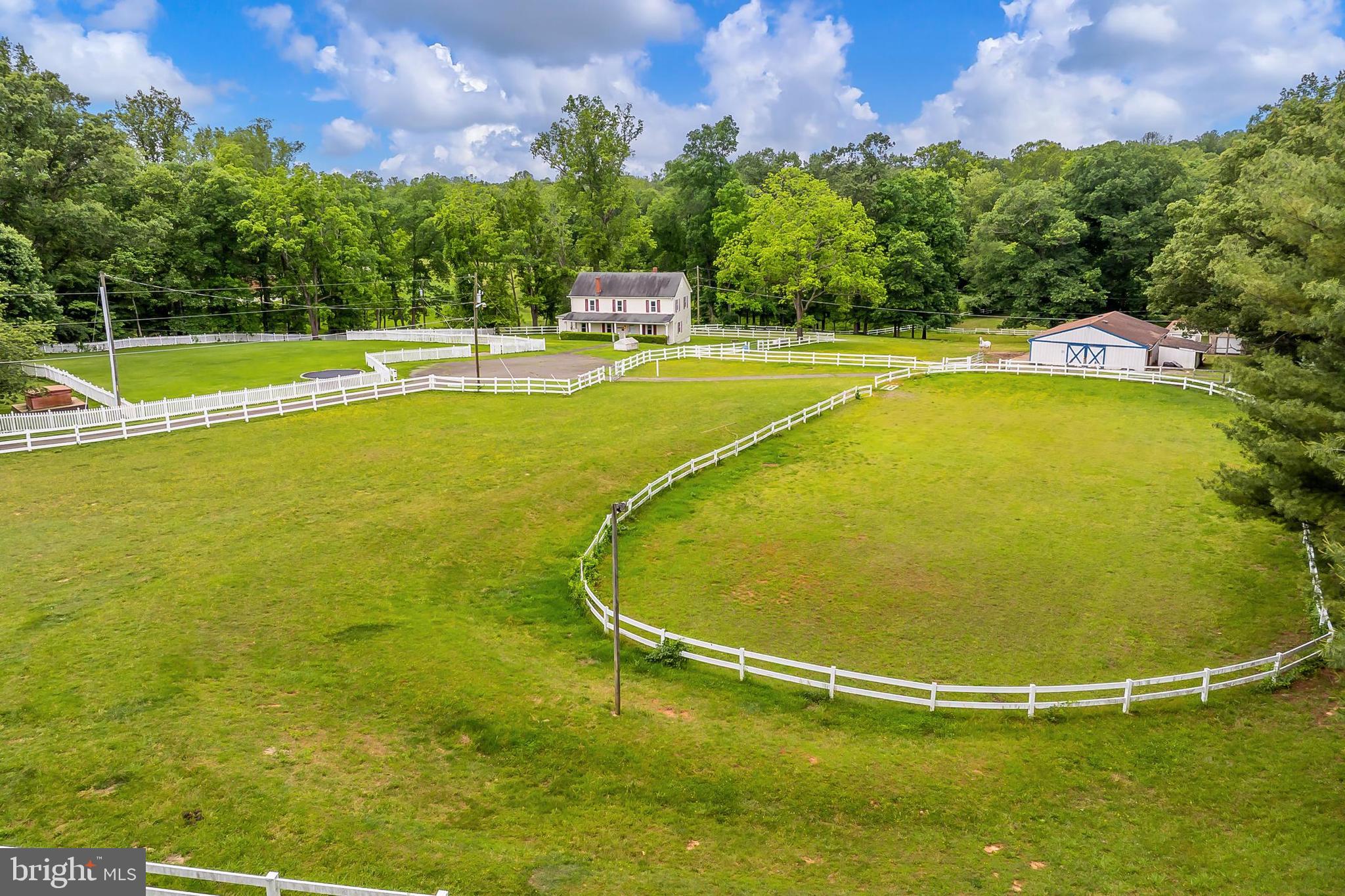 13310 Compton Road Clifton, VA 20124 - Photo 104 of 117 a view of a swimming pool with an outdoor space and seating area