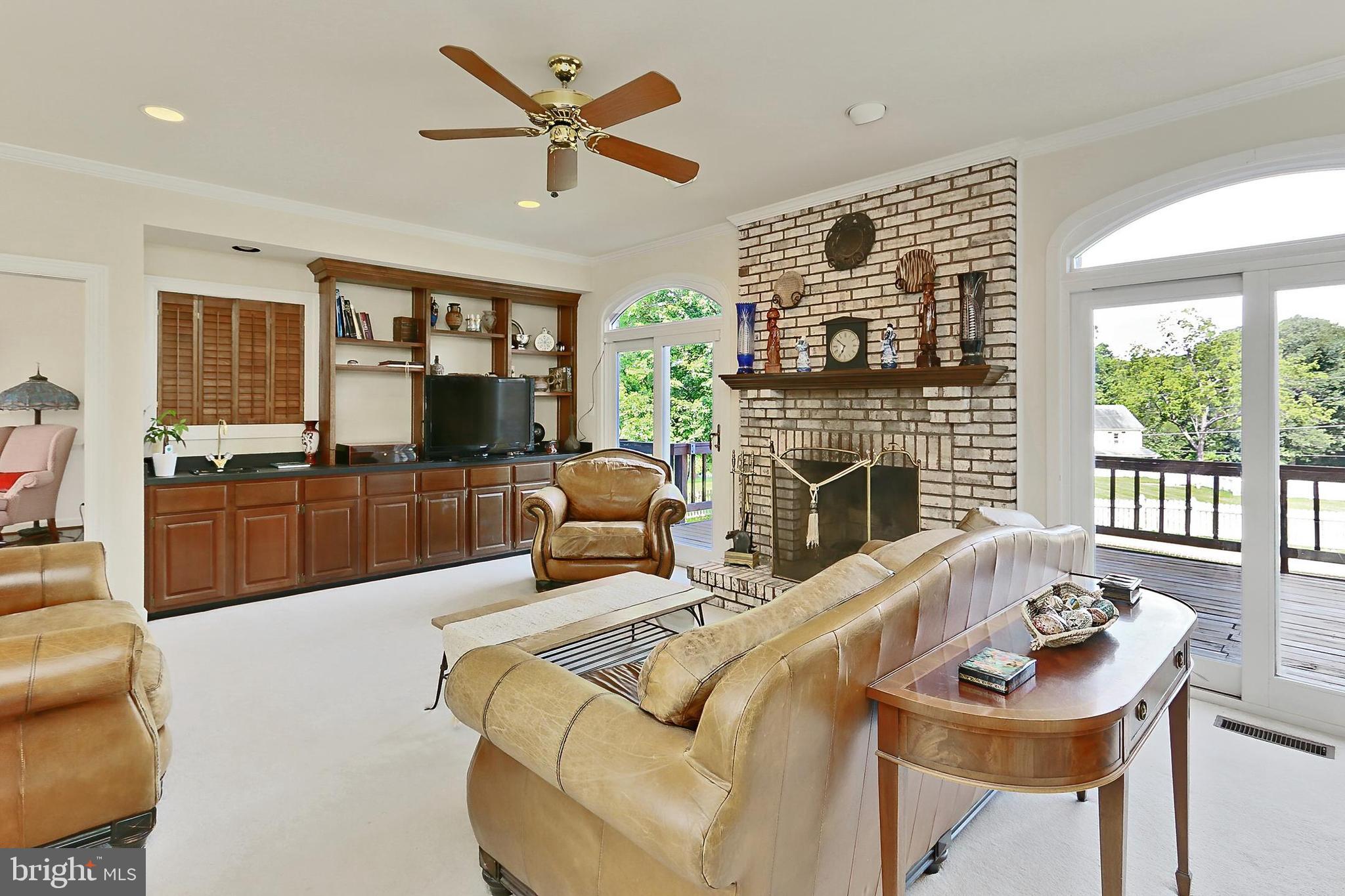 13310 Compton Road Clifton, VA 20124 - Photo 20 of 117 a living room with furniture and a fireplace