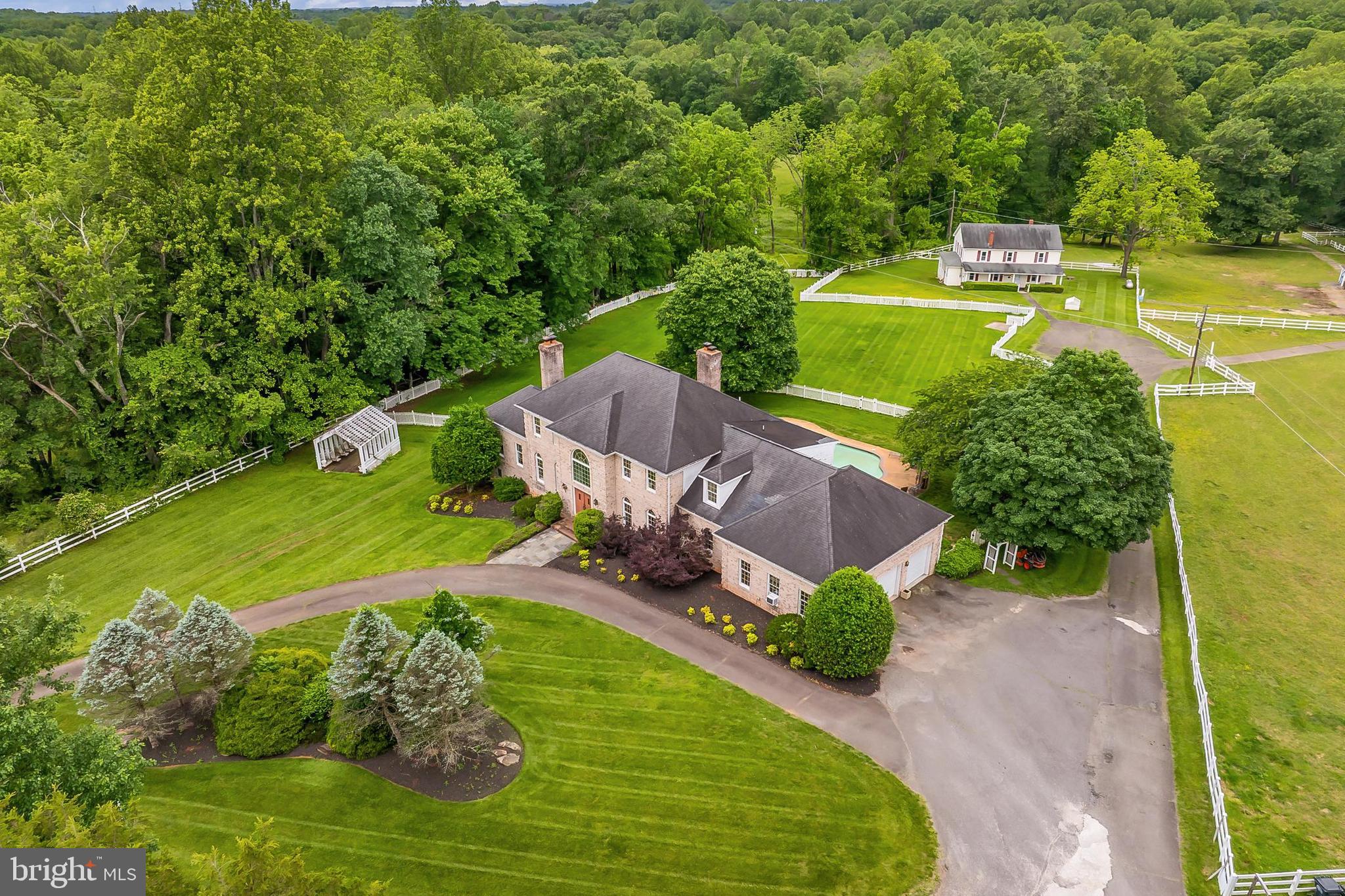 13310 Compton Road Clifton, VA 20124 - Photo 2 of 117 an aerial view of a house with a yard