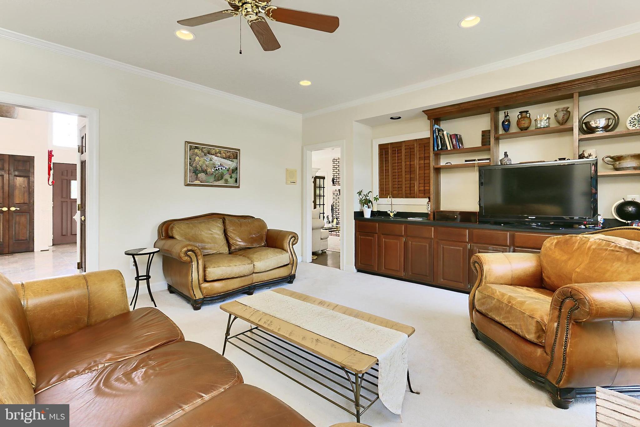 13310 Compton Road Clifton, VA 20124 - Photo 21 of 117 a living room with furniture and a flat screen tv