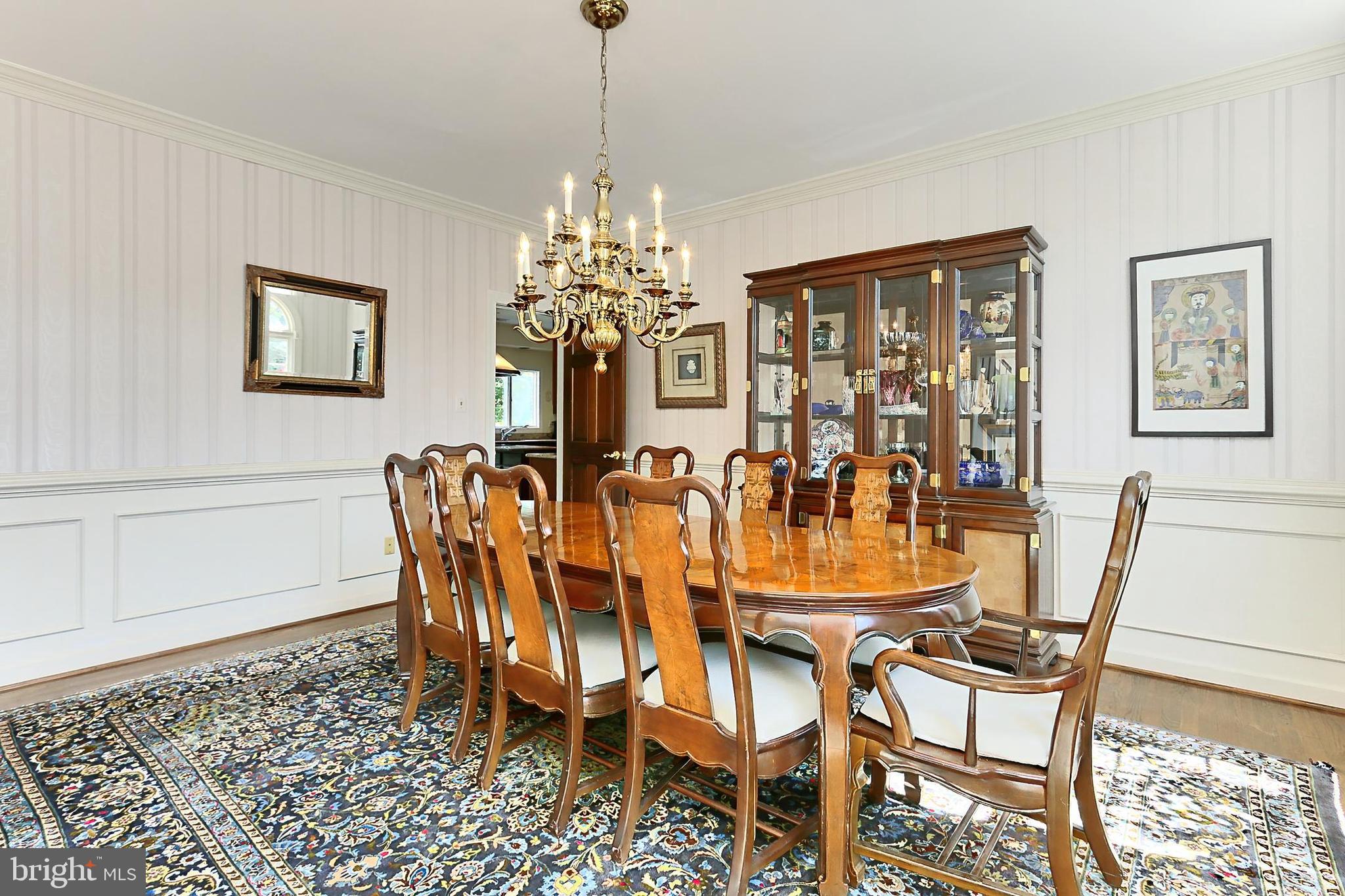 13310 Compton Road Clifton, VA 20124 - Photo 30 of 117 a view of a dining room with furniture and chandelier