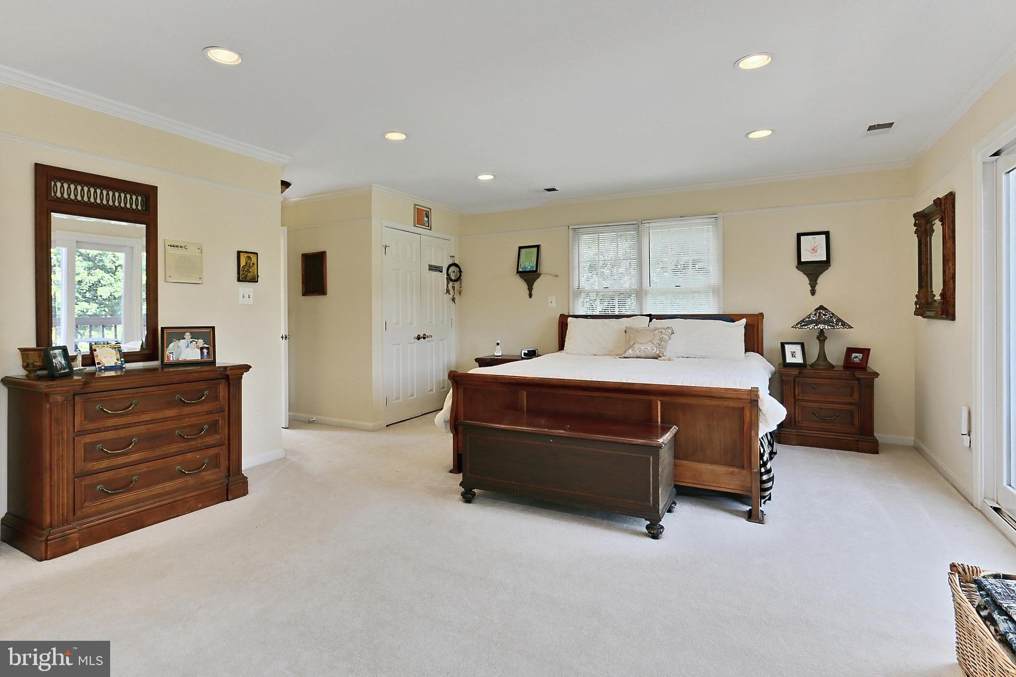 13310 Compton Road Clifton, VA 20124 - Photo 36 of 117 a bedroom with a bed and a dresser