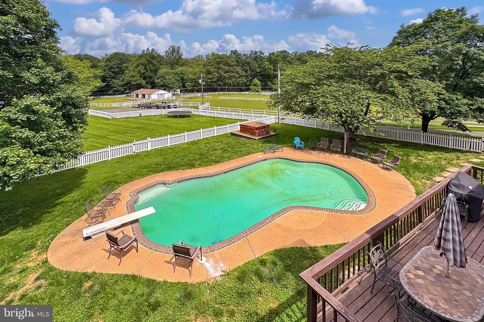13310 Compton Road Clifton, VA 20124 - Photo 39 of 117 an aerial view of a house having swimming pool and a yard