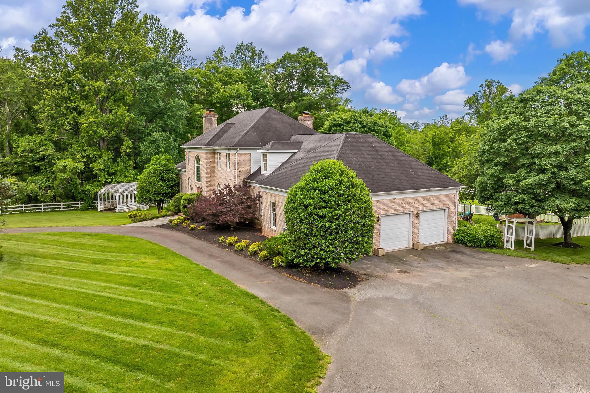 13310 Compton Road Clifton, VA 20124 - Photo 7 of 117 a view of a house with a big yard plants and large trees