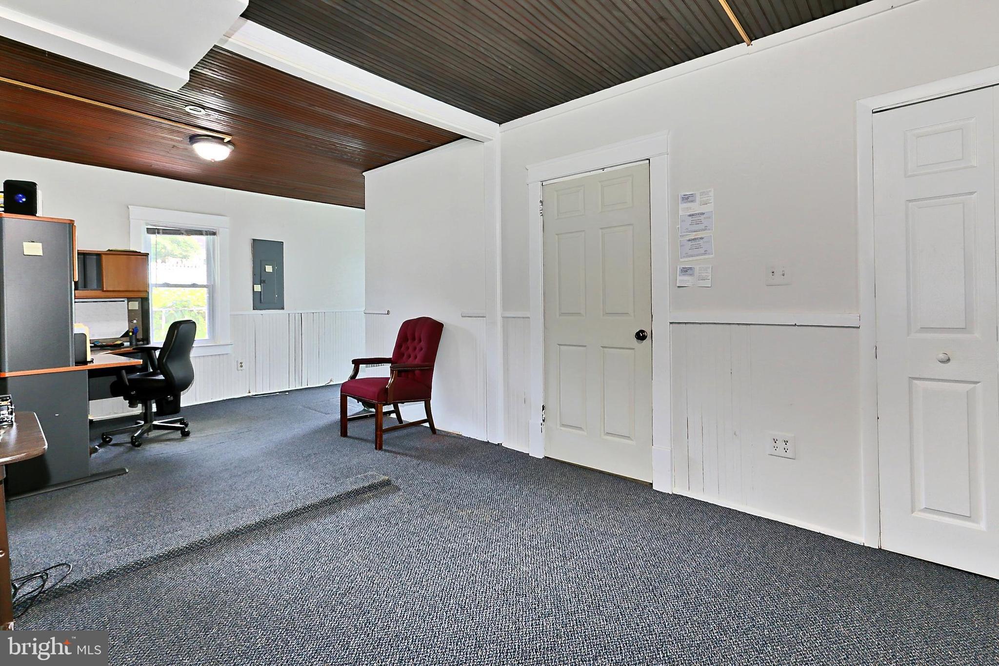 13310 Compton Road Clifton, VA 20124 - Photo 87 of 117 a living room with furniture and a chair
