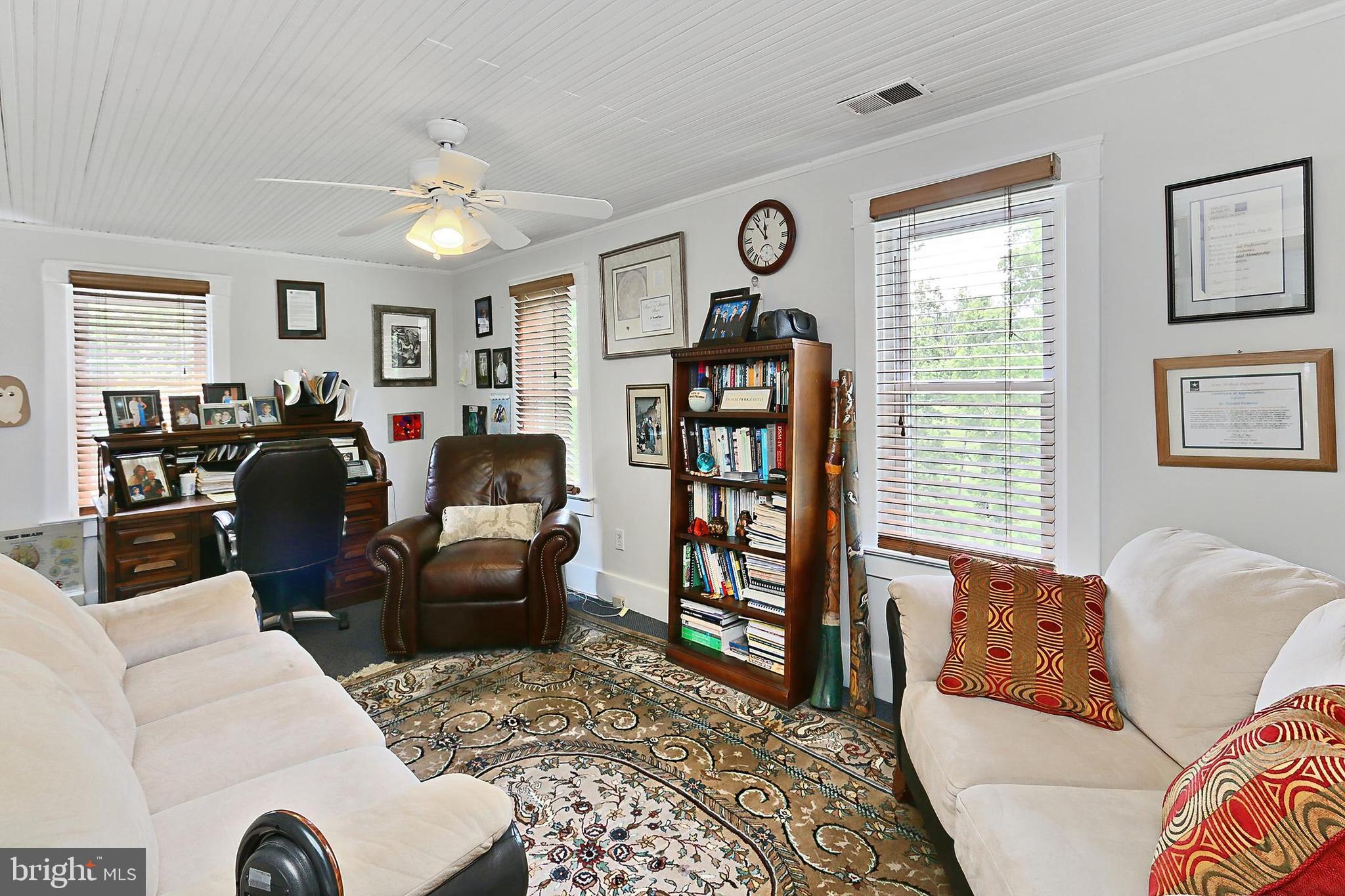 13310 Compton Road Clifton, VA 20124 - Photo 92 of 117 a living room with furniture and a window