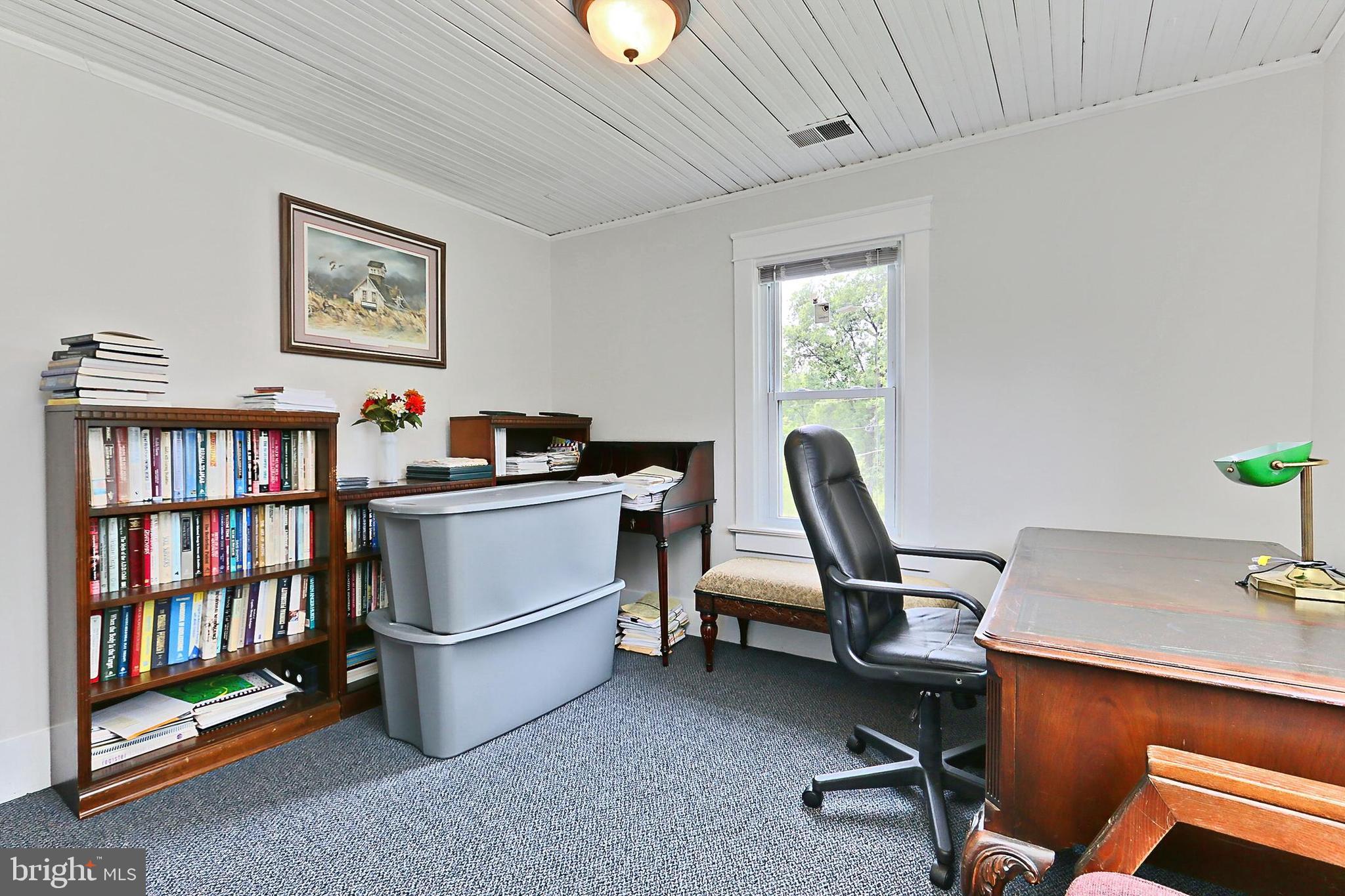 13310 Compton Road Clifton, VA 20124 - Photo 95 of 117 a work room with furniture and a book shelf