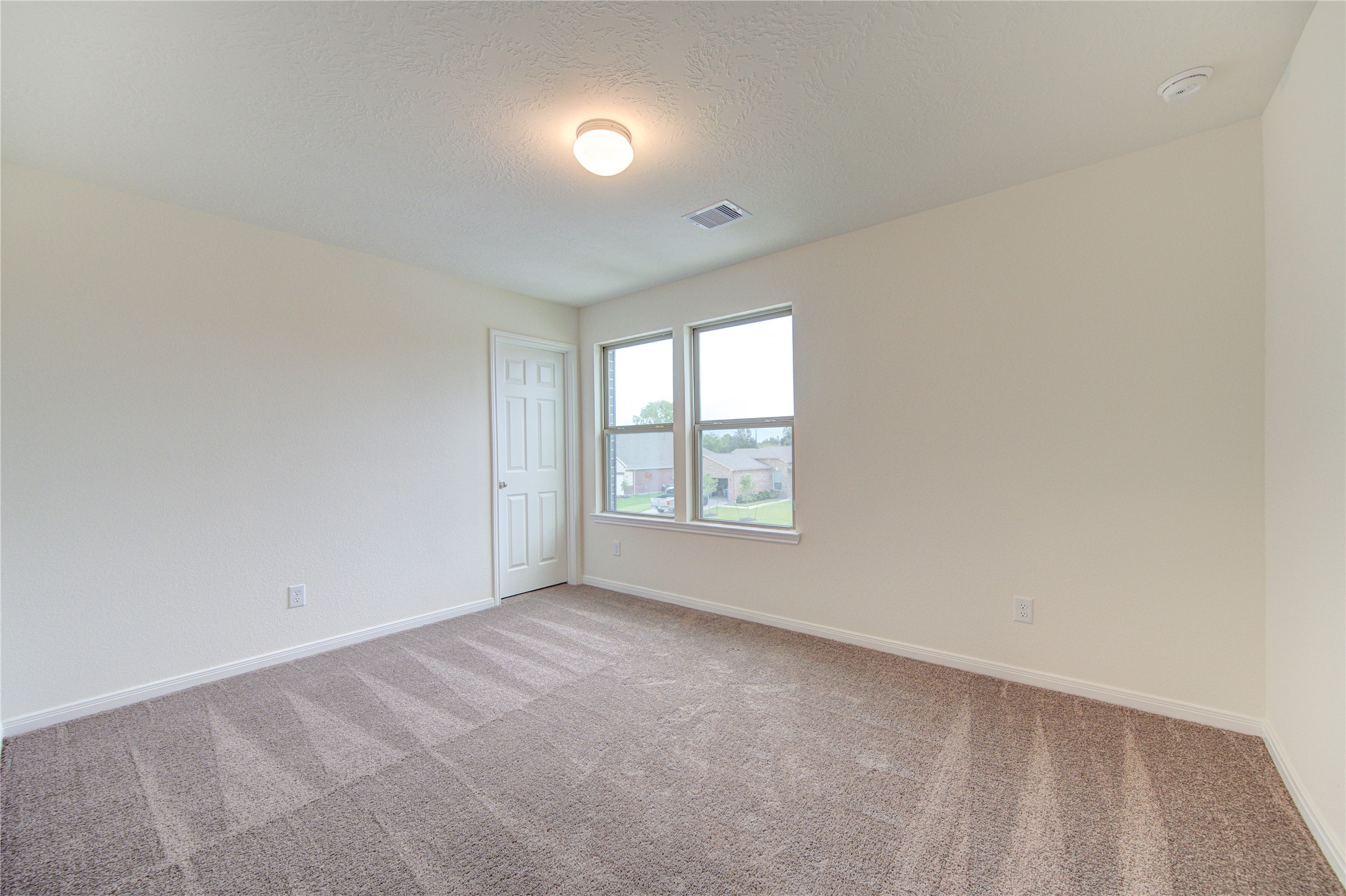 6120 Whitewing Road Rosenberg, TX 77469 - Photo 38 of 50 an empty room with a window