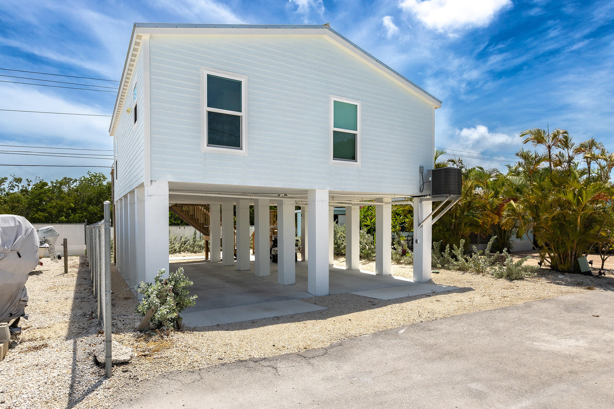 55 Boca Chica Road, Unit 27 Key West, FL 33040 - Photo 3 of 20 a front view of a house with a yard