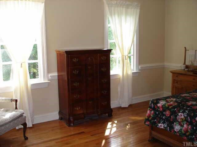 5501 North Hawthorne Way Raleigh, NC 27613 - Photo 6 of 10 Master bedroom with new (refinishable) hardwood floors. Other