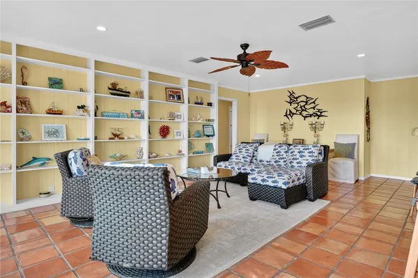 a living room with furniture and a rug