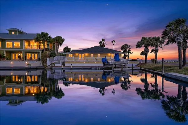 a view of swimming pool with outdoor seating
