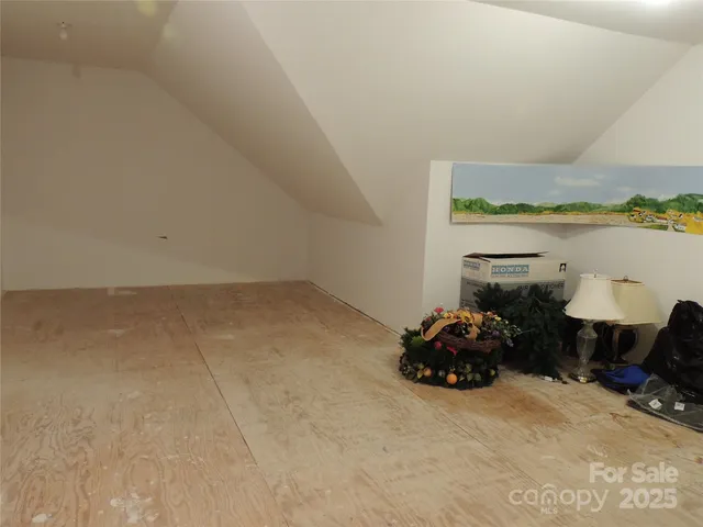 a bathroom with a toilet and shower