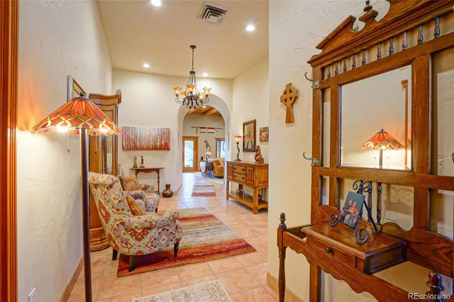 a view of a living room and dining room