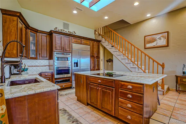 a view of a kitchen with cabinets