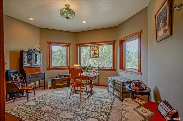 a view of a livingroom with furniture