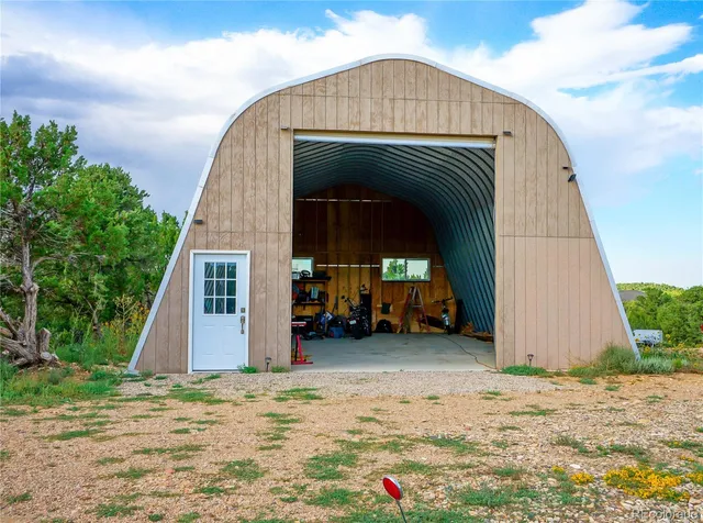 a view of a garden with a barbeque