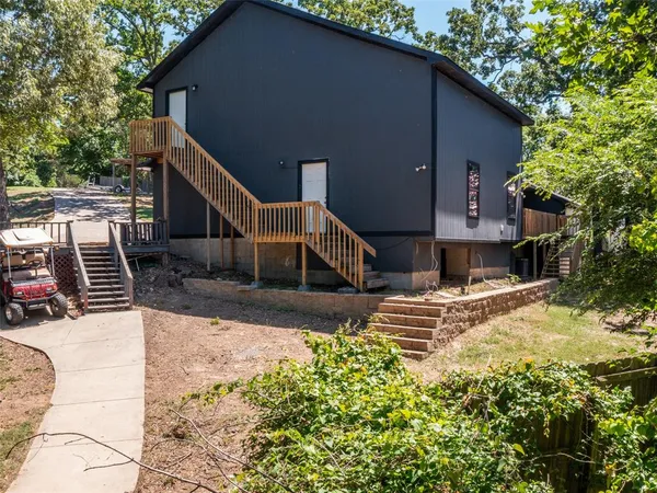 a view of a back yard of the house