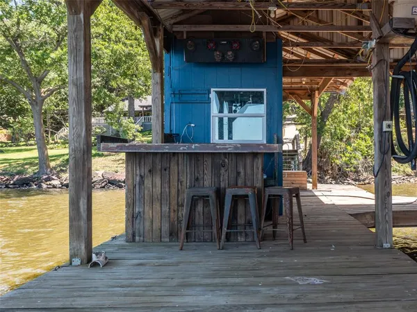 a front view of a house with a boat