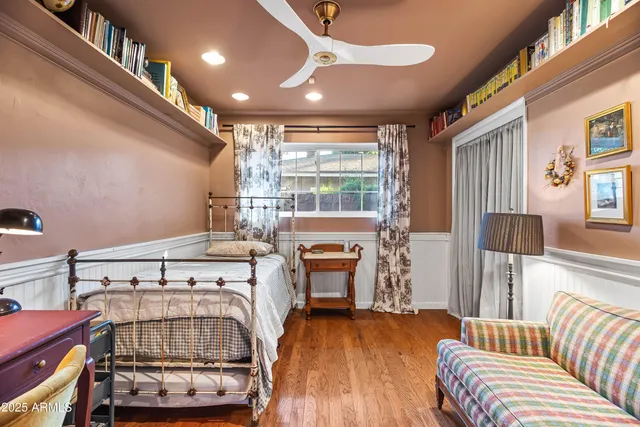 a view of a livingroom with furniture and staircase
