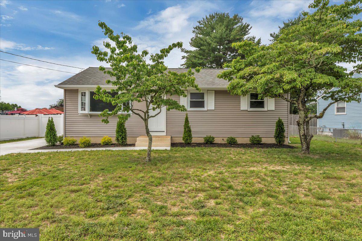 147 Country Club Road Pine Hill, NJ 08021 - Photo 16 of 53 a house that has a tree in front of it