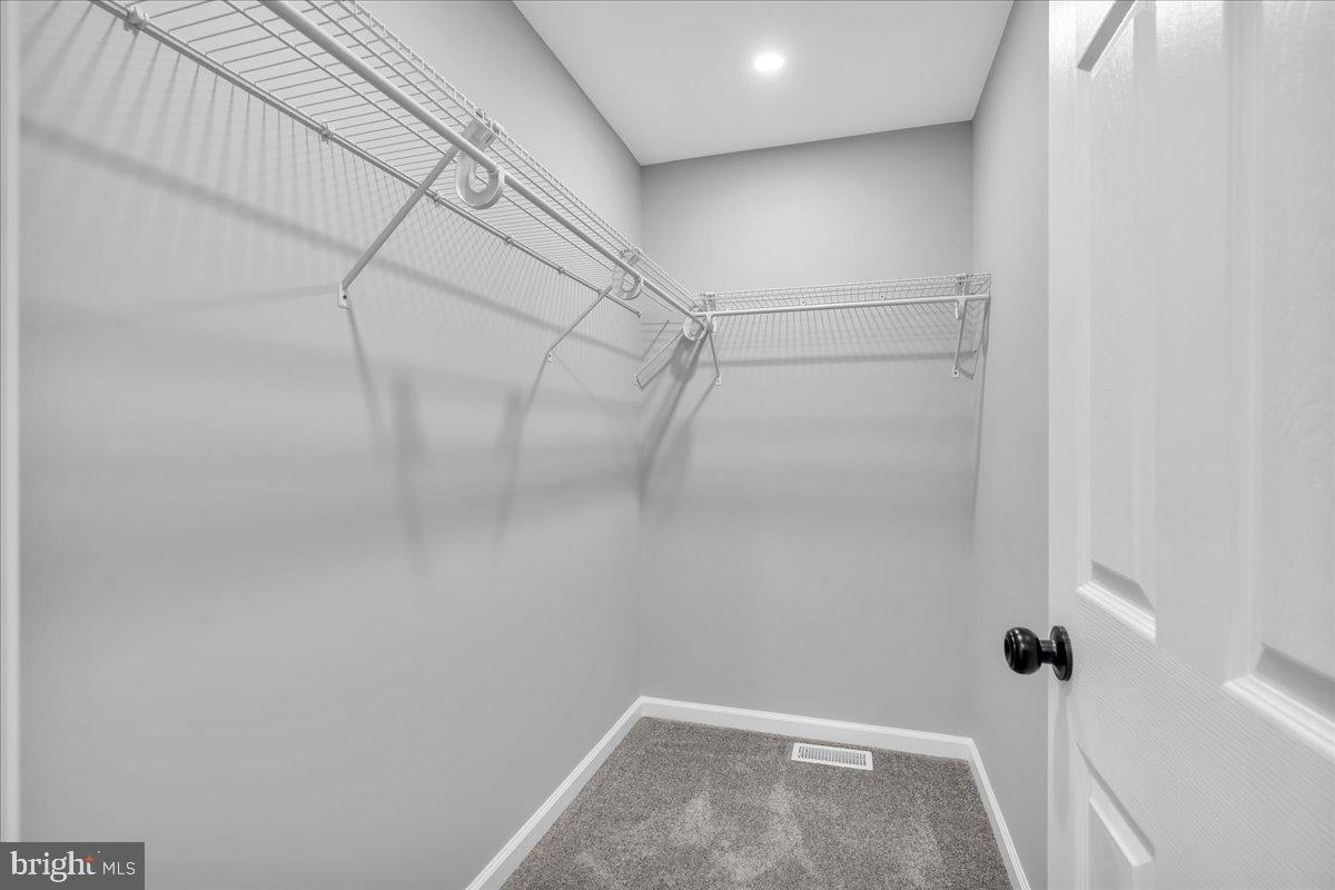 147 Country Club Road Pine Hill, NJ 08021 - Photo 20 of 53 a view of a room with racks on the wall