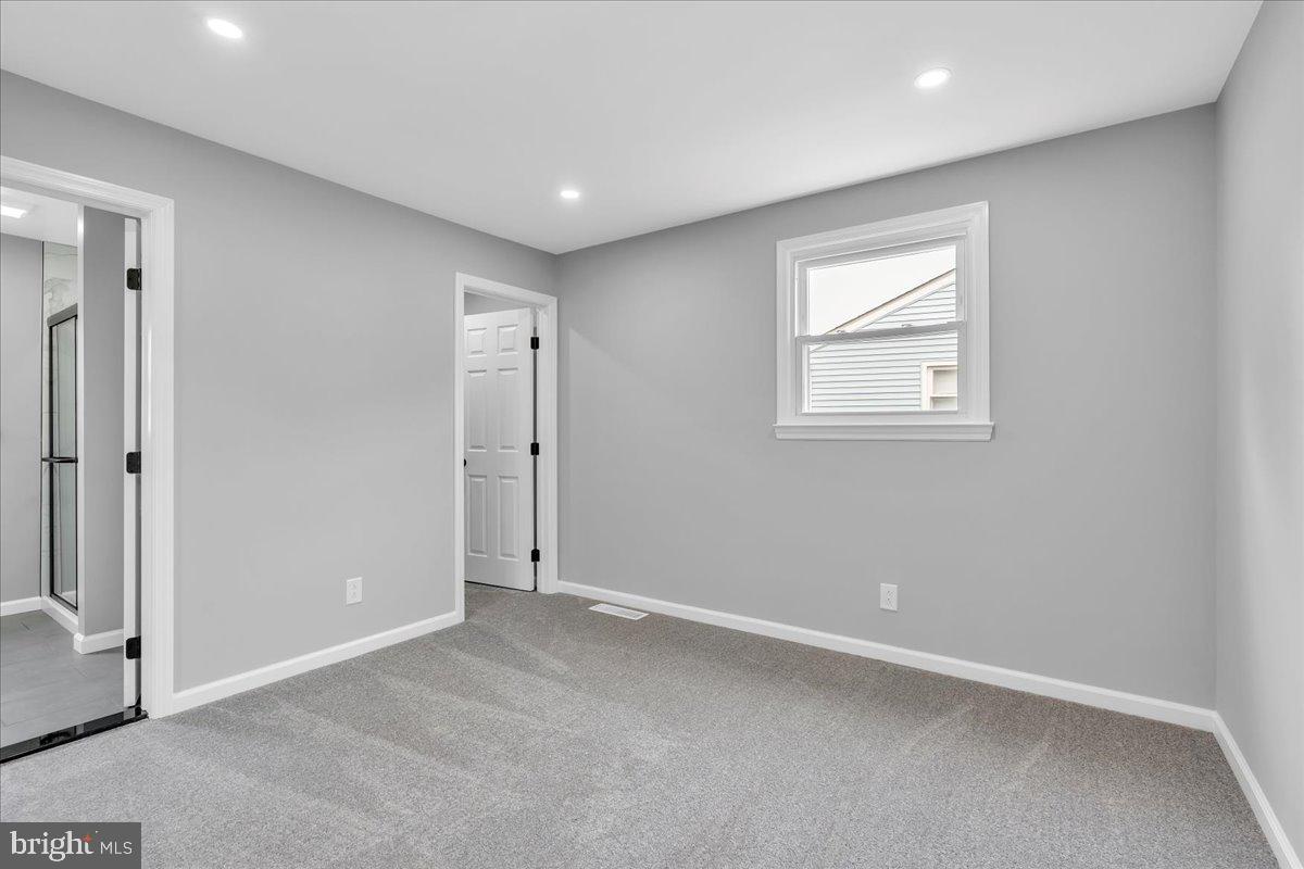 147 Country Club Road Pine Hill, NJ 08021 - Photo 31 of 53 an empty room with windows and closet