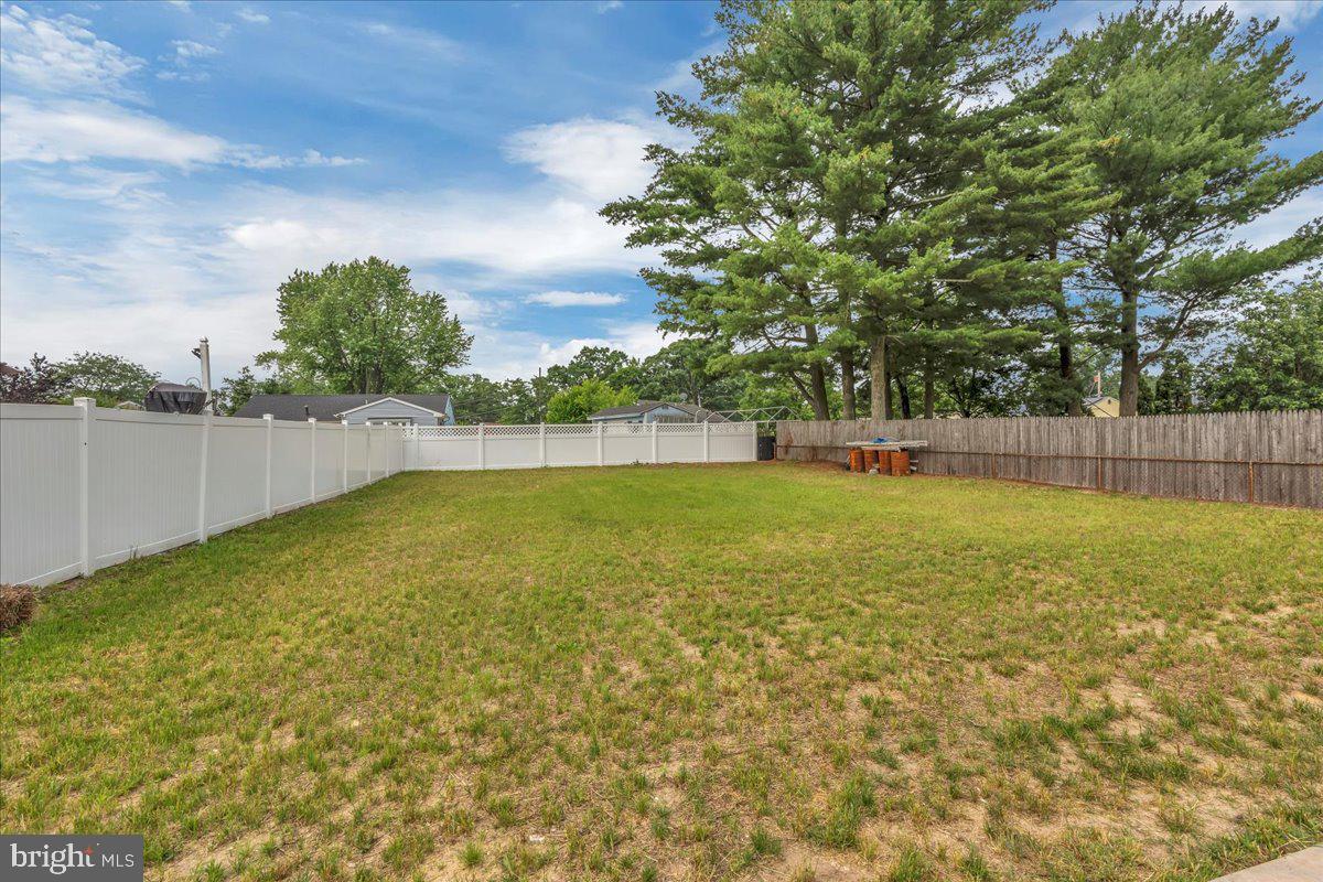 147 Country Club Road Pine Hill, NJ 08021 - Photo 34 of 53 a view of yard with swimming pool and green space
