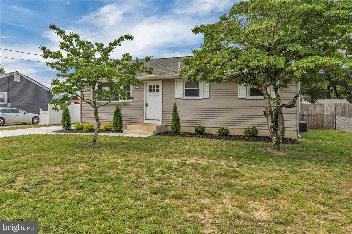 147 Country Club Road Pine Hill, NJ 08021 - Photo 43 of 53 a house with green field in front of it
