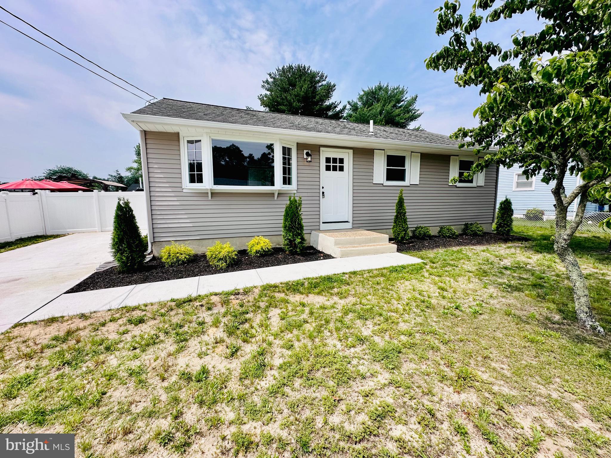 147 Country Club Road Pine Hill, NJ 08021 - Photo 52 of 53 a house view with a garden space