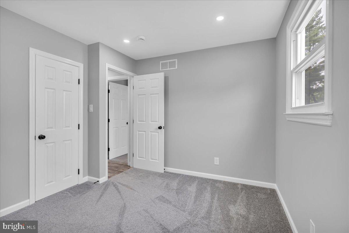 147 Country Club Road Pine Hill, NJ 08021 - Photo 9 of 53 a view of an empty room with a window