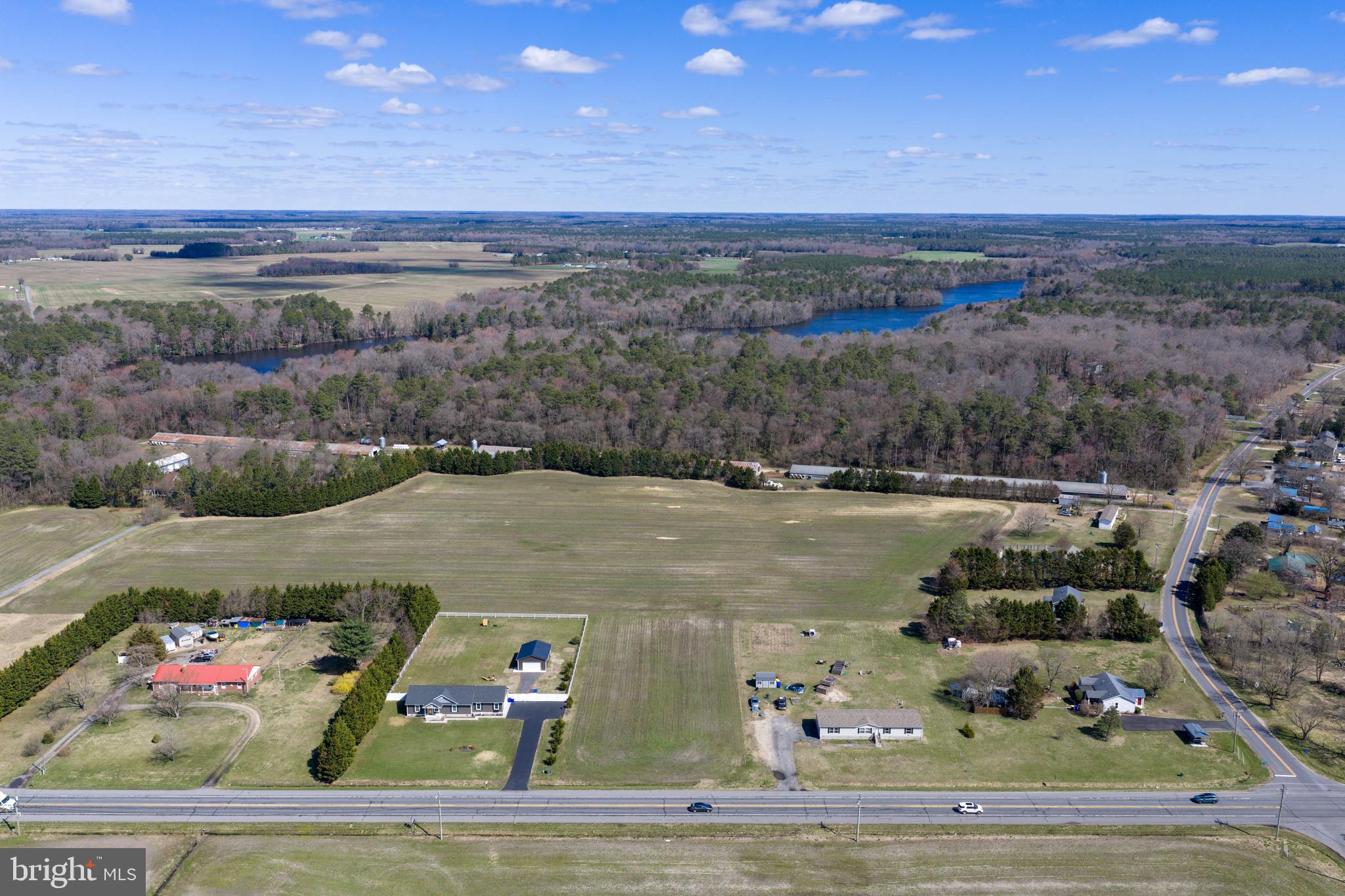 13651 Wilson Hill Road Georgetown, DE 19947 - Photo 12 of 23 a view of lake with mountain
