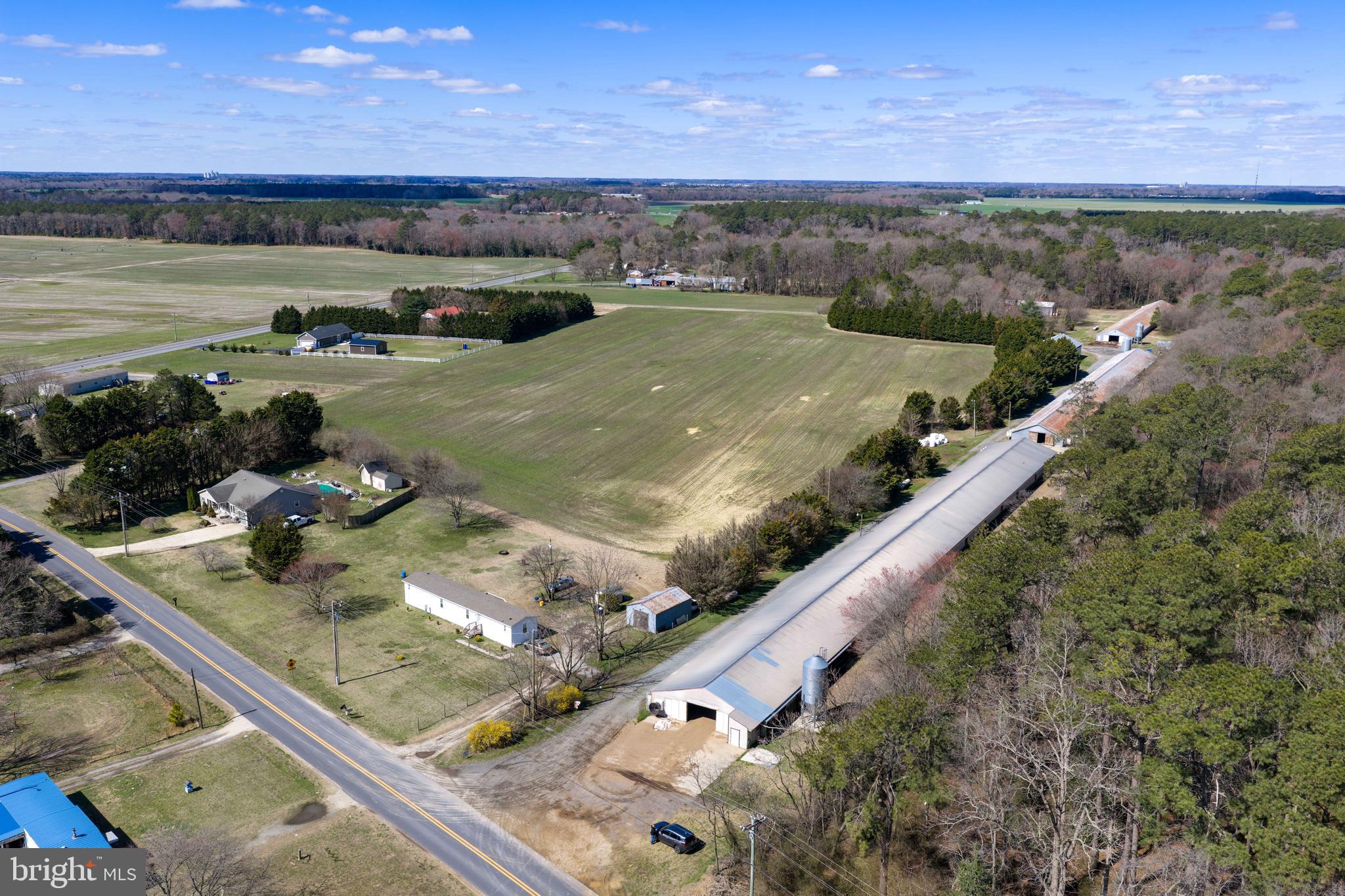 13651 Wilson Hill Road Georgetown, DE 19947 - Photo 4 of 23 a view of a balcony with an ocean view