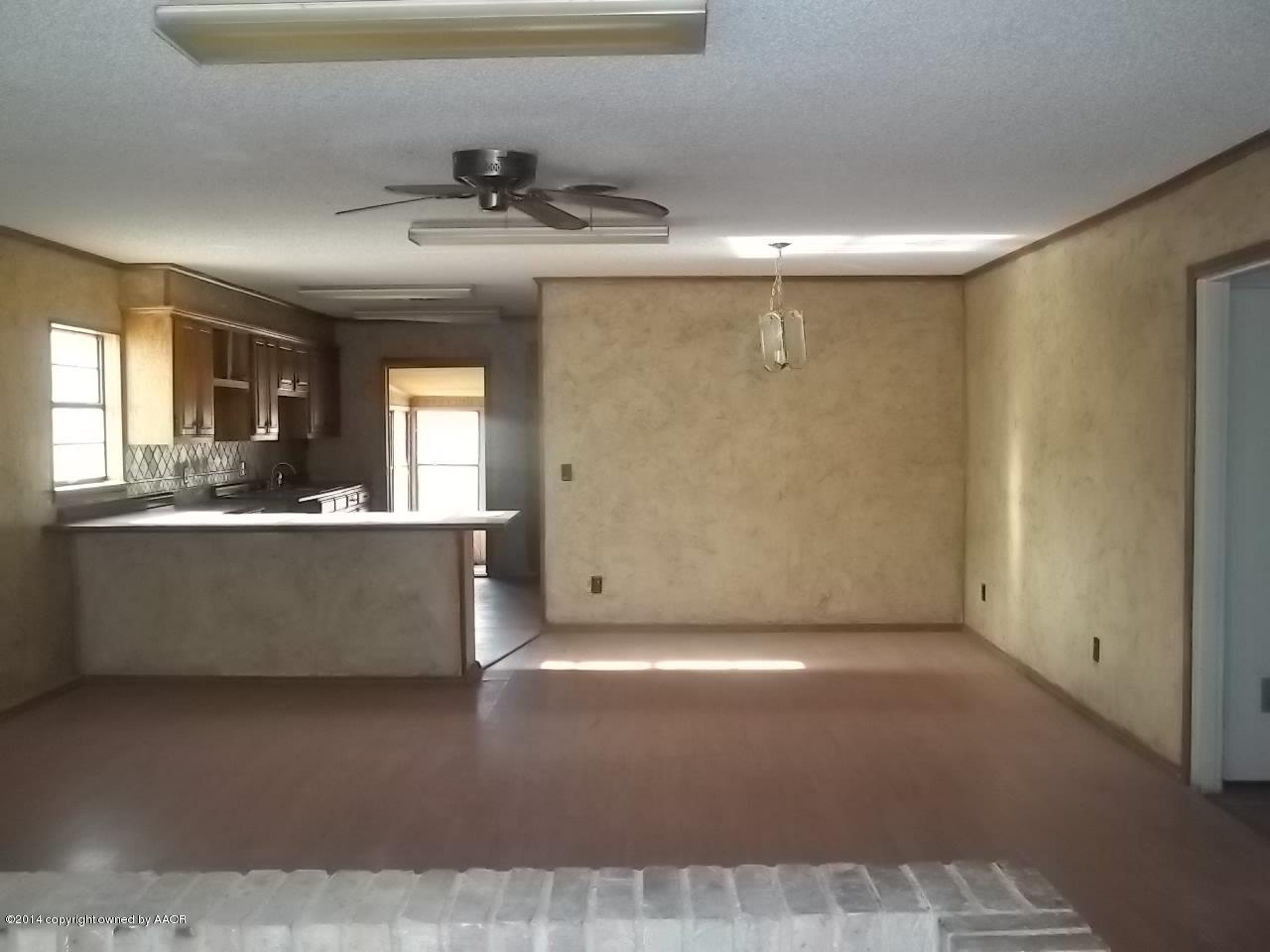 5104 Arden Road Amarillo, TX 79110 - Photo 9 of 9 a view of kitchen and front door