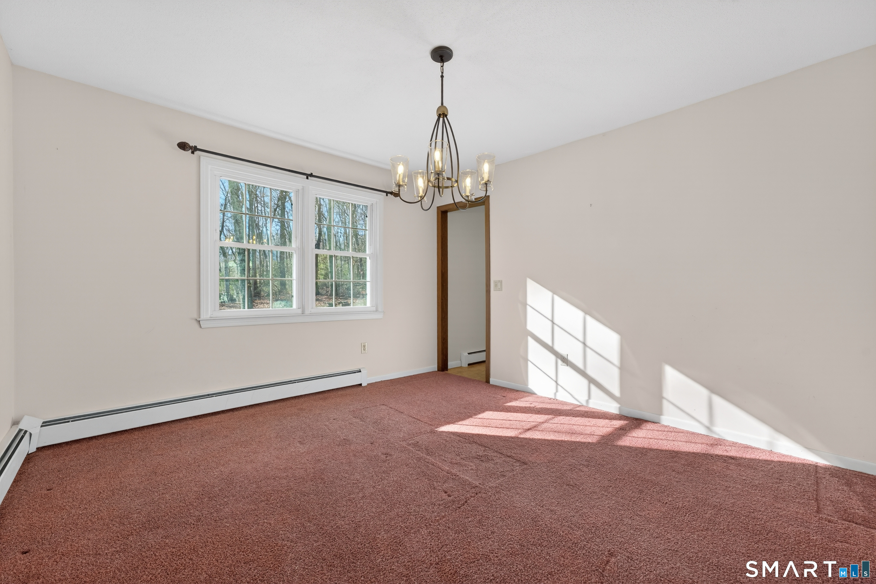 29 Legendary Road East Lyme, CT 06333 - Photo 11 of 36 an empty room with windows and entrance